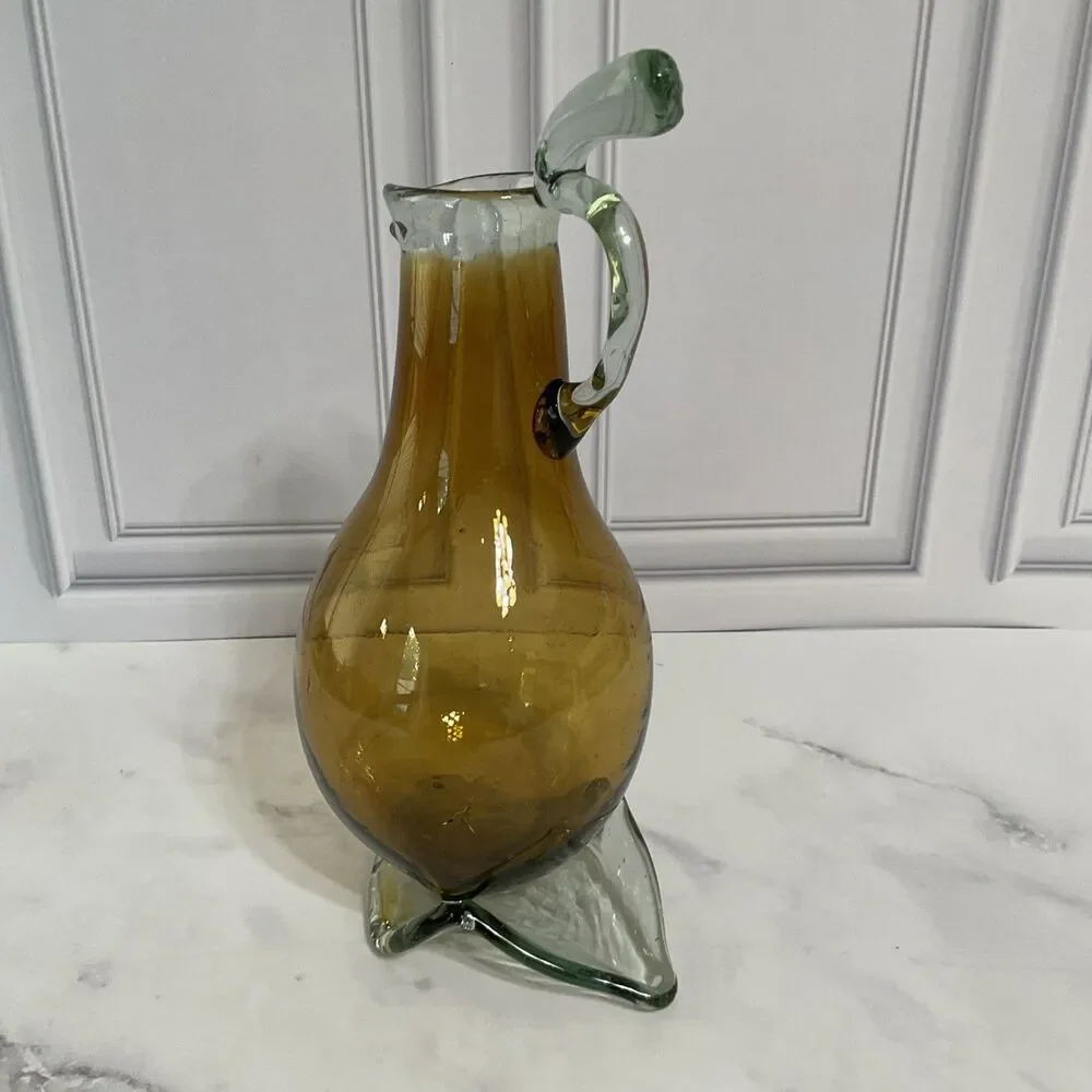 Hand Blown Glass Amber Pitcher with attached Clear Handle 10.5”Tall Clear Base